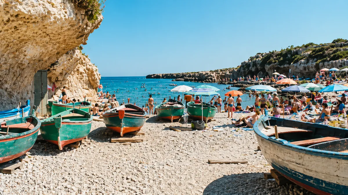 Turquoise water at Cala Incina rocky cove near Polignano a Mare